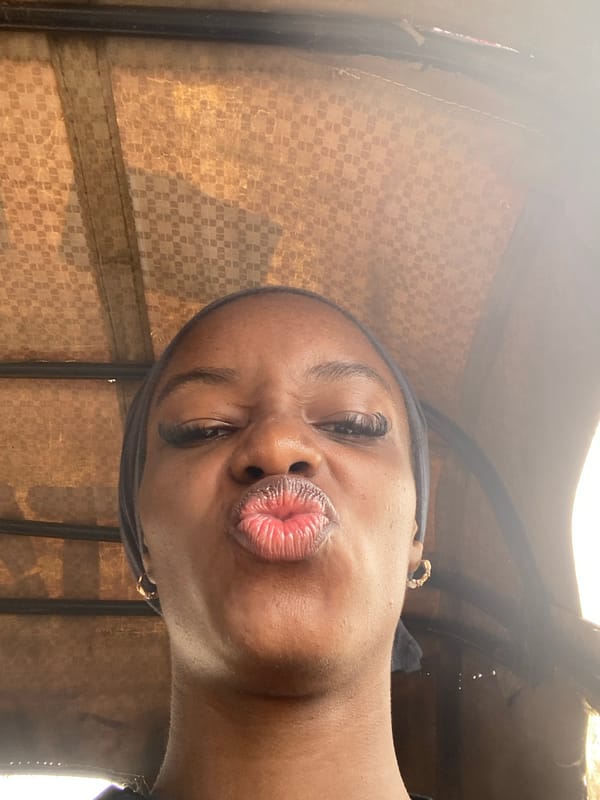 Candid moments inside a vehicle in Jos, Nigeria