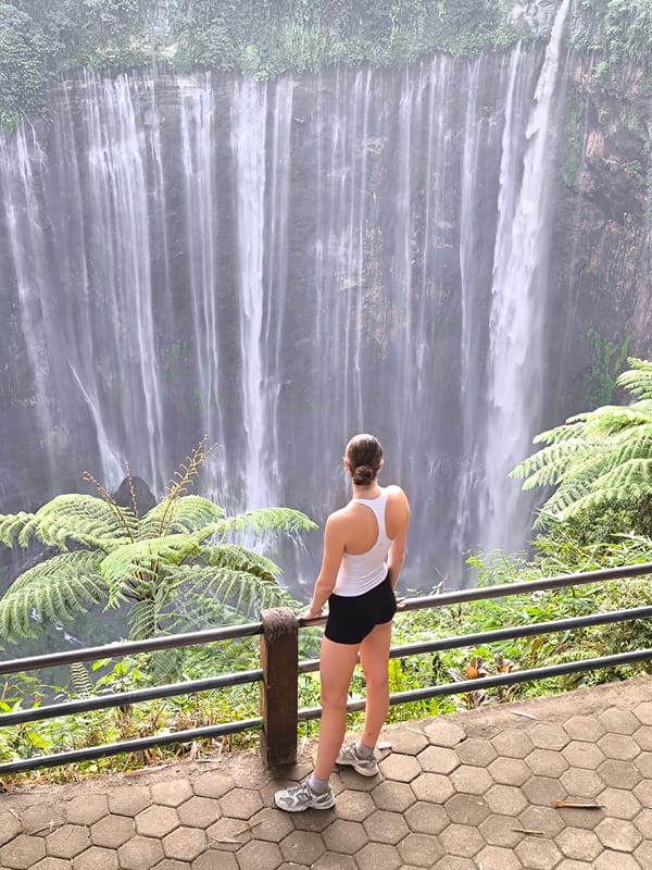Morning visit to Tumpak Sewu's dramatic curtain waterfall, East Java