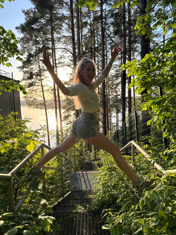 Woman poses on metal structure in Прикамский, Russia