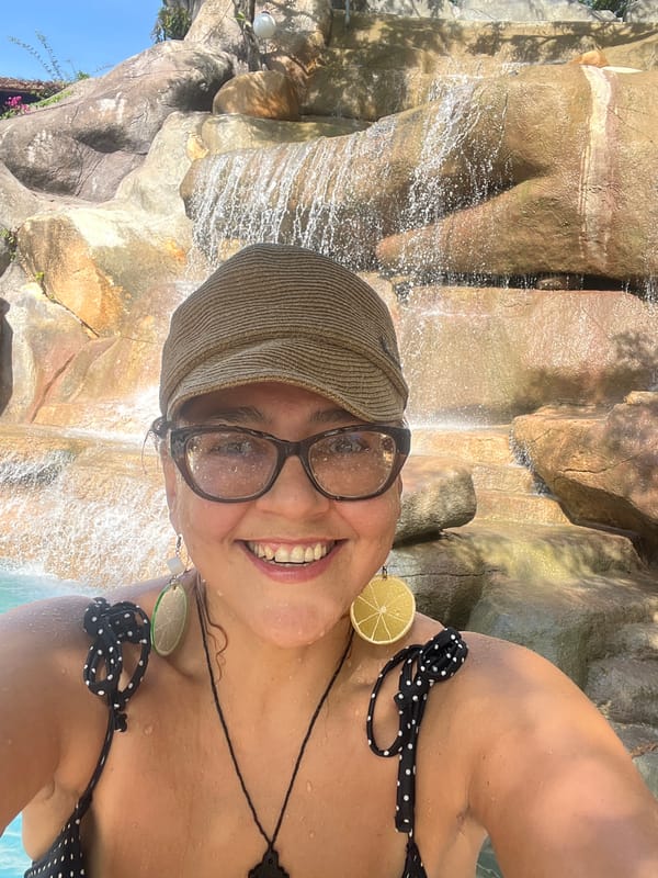 Woman Takes Waterfall Selfies at Vietnam Resort Pool