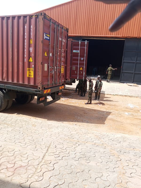 Military oversees warehouse loading operations in Pasere, Nigeria