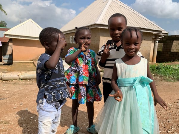 Kids in a Jos neighborhood, candid portraits and everyday moments
