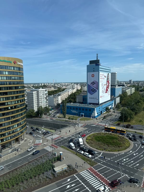 Aerial views over Warsaw's Rondo Daszyńskiego roundabout and modern skyline