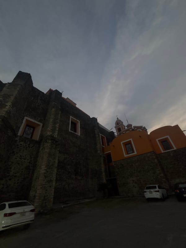 Historic stone building photographed in San Andrés Cholula
