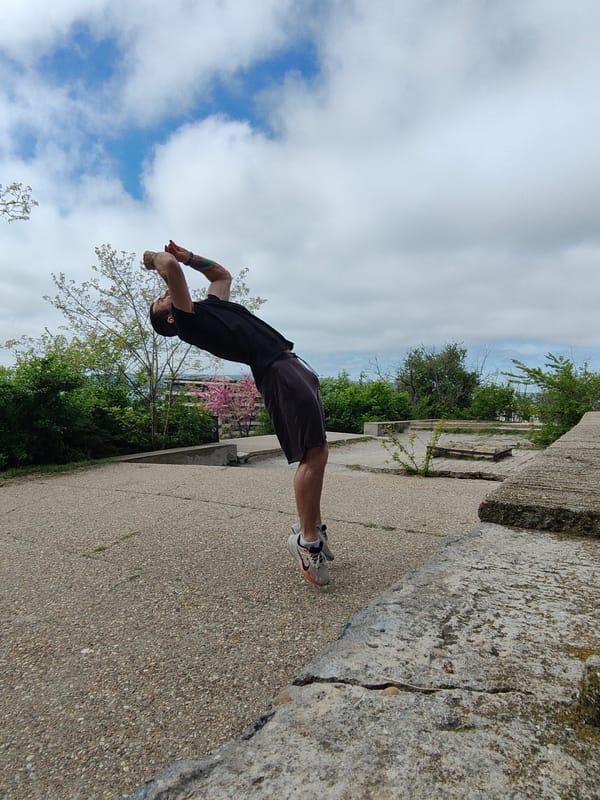 Man performs backflips near Soviet monument in Varna Bulgaria