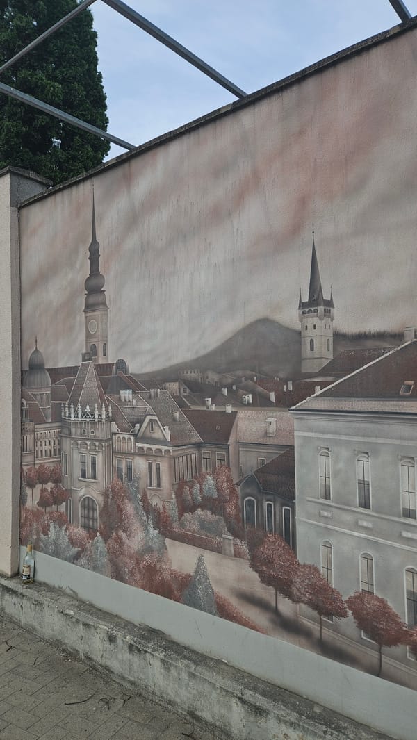 Afternoon stroll through historic Prešov captures murals and street life