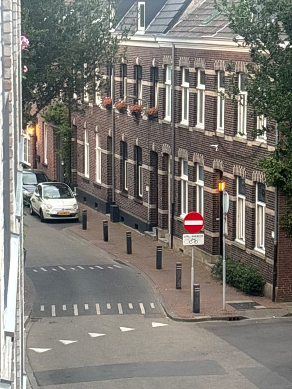 Sittard streets at golden hour, cobblestones and fading light