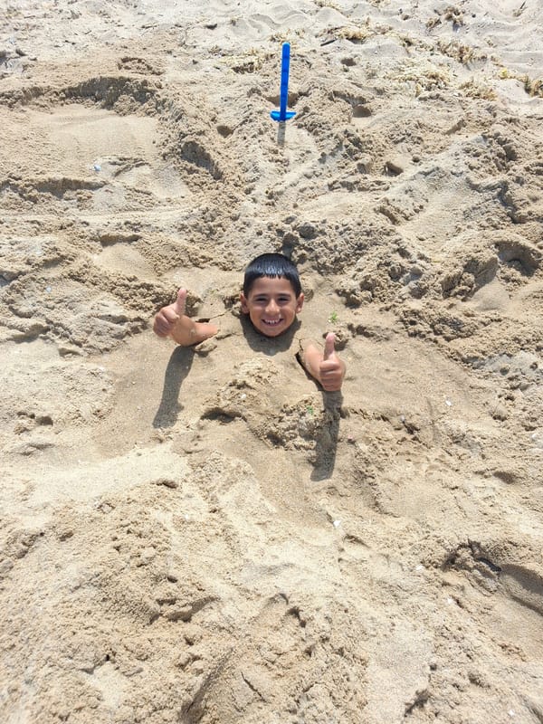 Beach burial fun at Shkorpilovtsi with thumbs up
