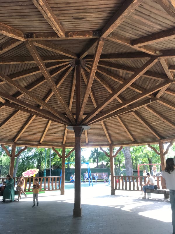 Afternoon park visit in Kharkiv with gazebo and playground