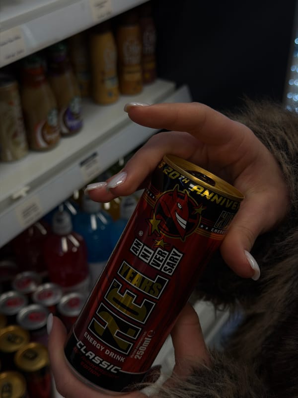 Person holds anniversary energy drink in Sofia store