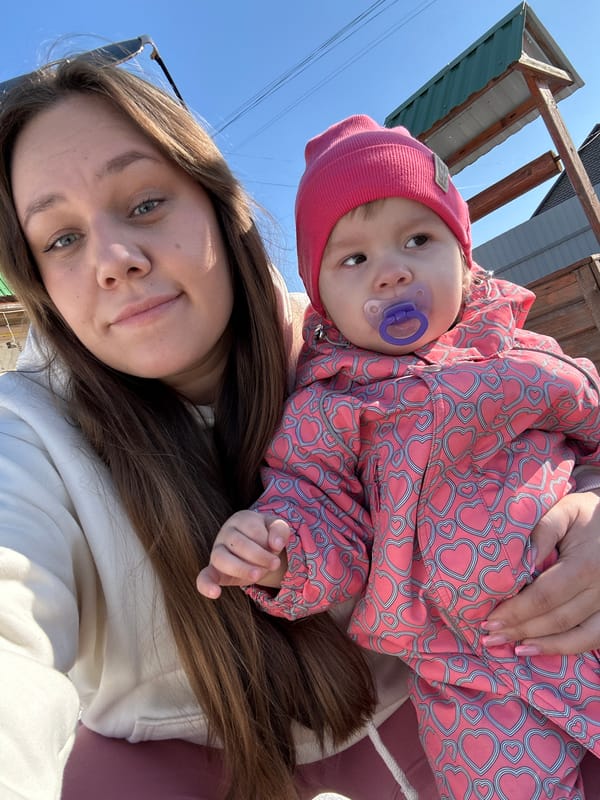 Family enjoys sunny winter day in Russian village
