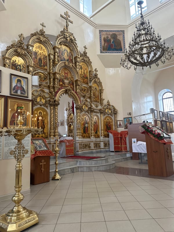 Orthodox church interior with ornate iconostasis documented in Votkinsk