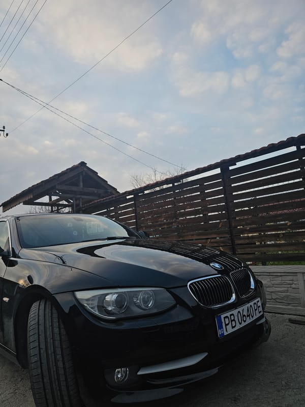 Black BMW parked on dirt road in Krasnovo, Bulgaria