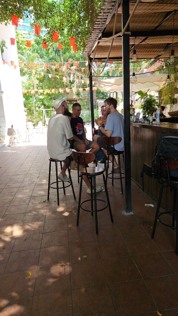 Late night socializing and dog antics at Nha Trang cafe