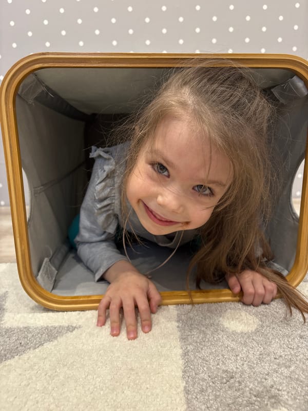 Child plays peek-a-boo from container in Votkinsk, Russia