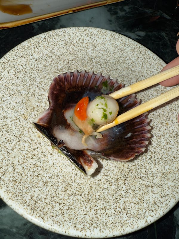 Diners enjoy sushi and seafood at Barcelona Japanese restaurant