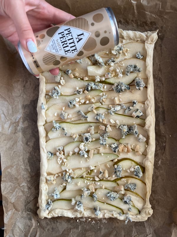 Home baker prepares pear blue cheese tart in Shushary