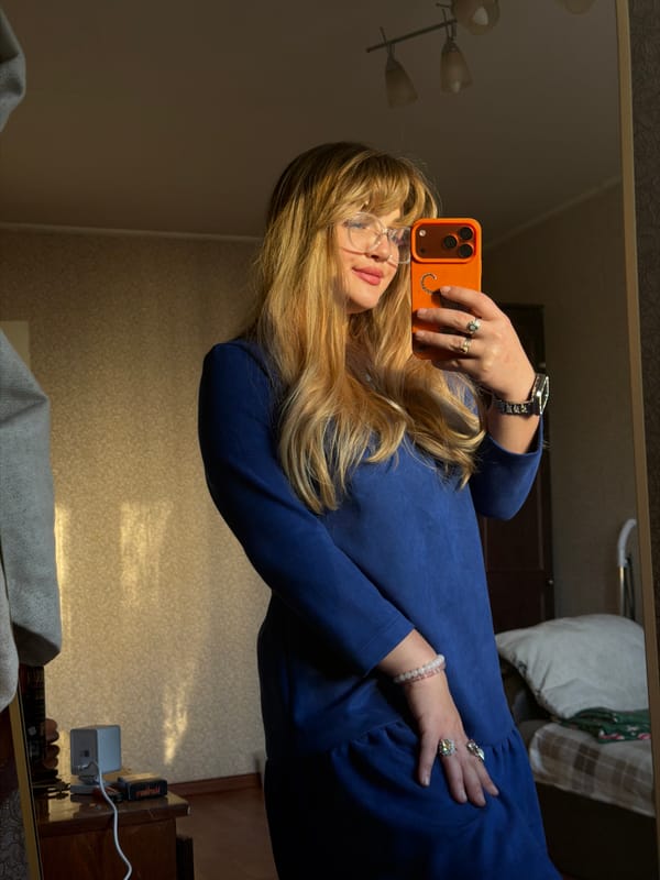 Woman takes mirror selfies in Russian city apartment