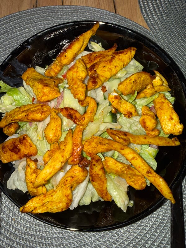 Home cook documents spiced chicken salad dinner in Varna
