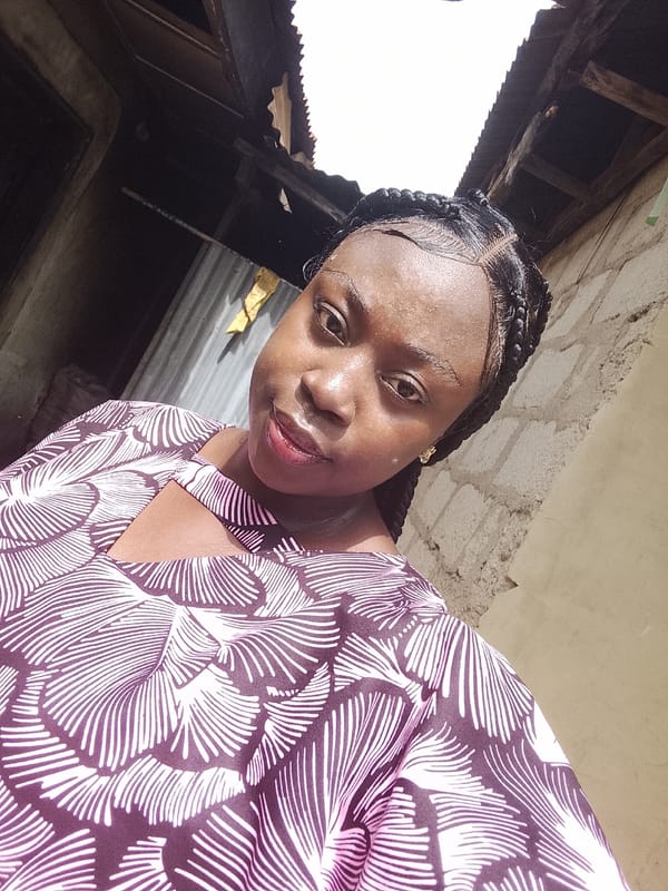 Woman takes selfie in Akwanga, Nigeria