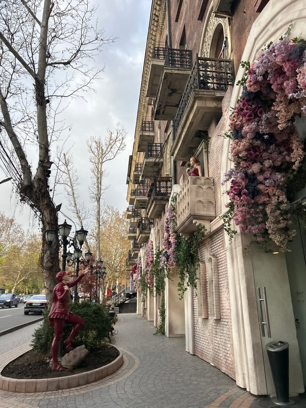 Everyday life documented across Yerevan's muraled streets and cafes