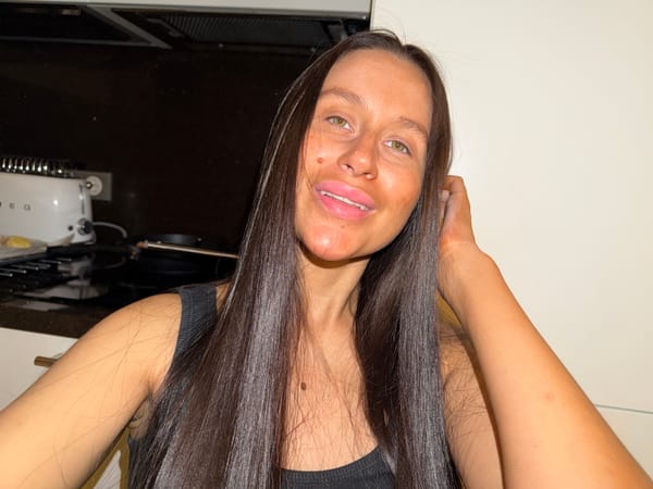 Dark-haired woman observed from inverted angle in Khimki