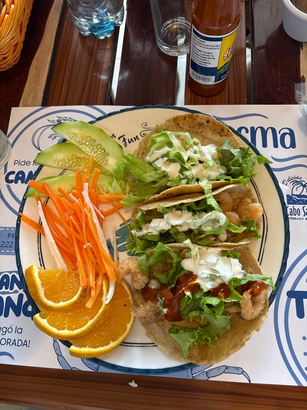 Shrimp tacos with sides photographed in Tlaxcalancingo, Mexico