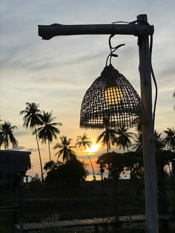 Sunset and recycled art captured at Thai beachfront location