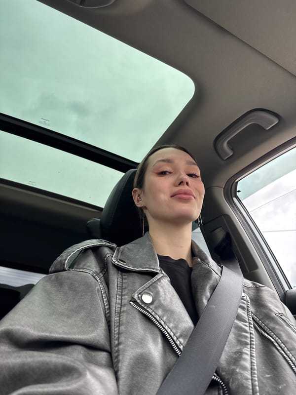 Woman photographed in extended car photo session