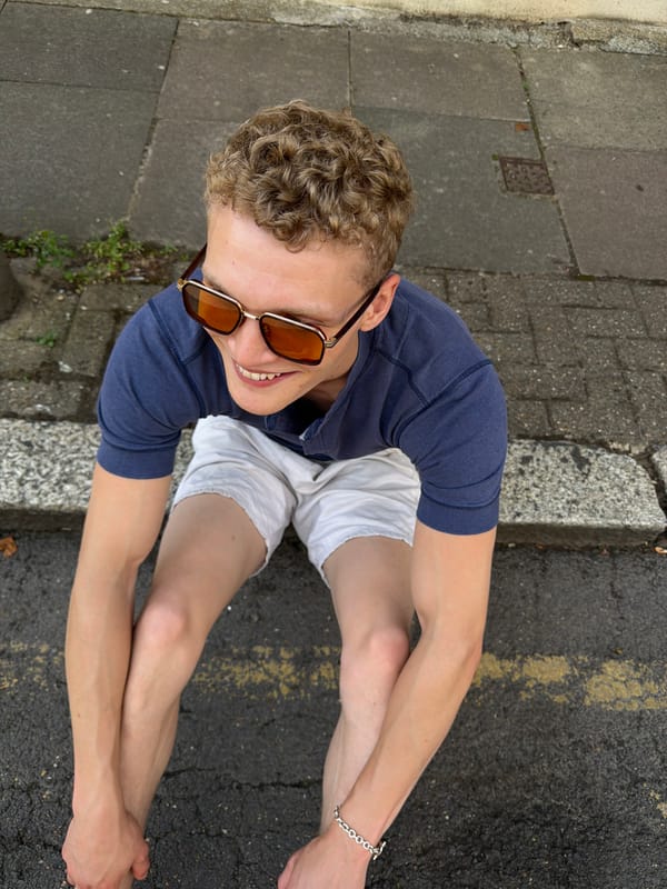 Sitting on a yellow-lined pavement in London