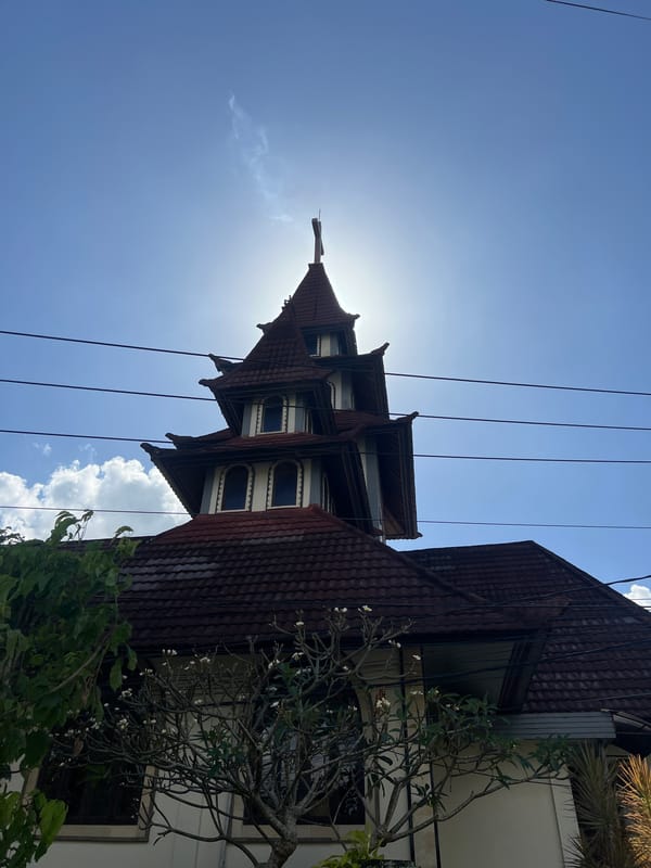Catholic church with red-tiled towers in North Kuta, Bali