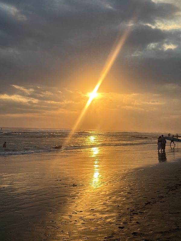 Sunset beach stroll with a cafe break