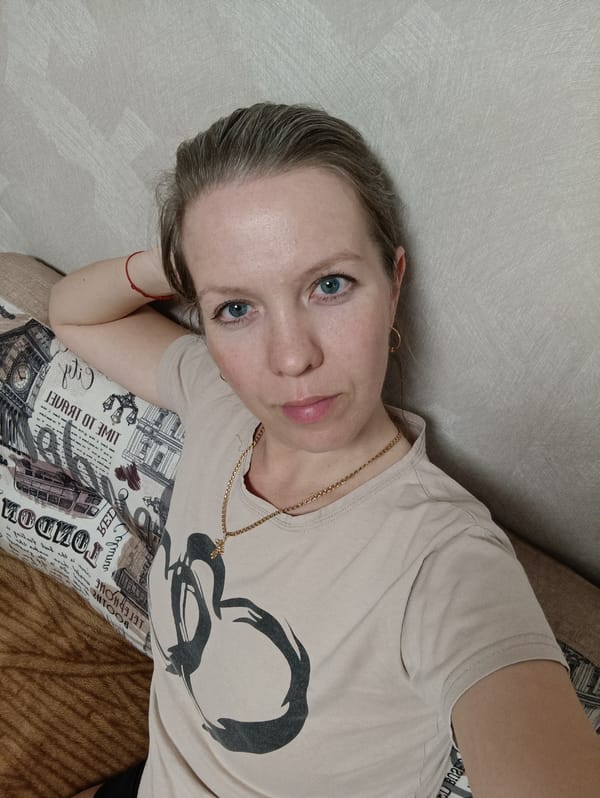 Woman resting indoors observed in Chaikovsky, Russia