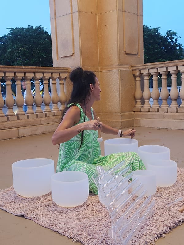 Crystal singing bowl session at dusk on Altamonte Springs waterfront