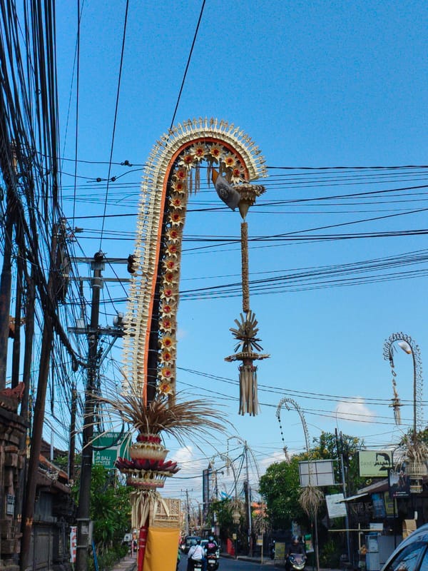 Ornate woven ceremonial structure on a Denpasar street