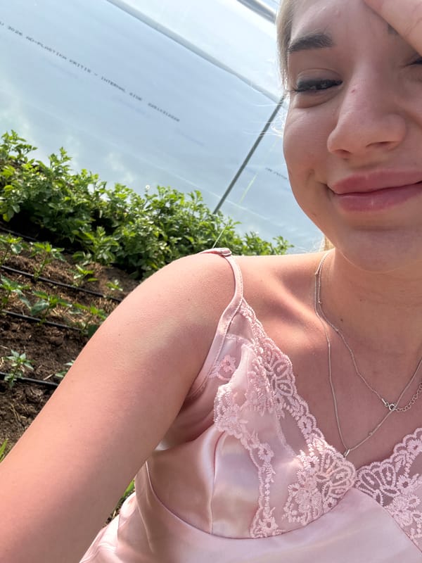 Woman poses for photos in Bulgarian greenhouse setting