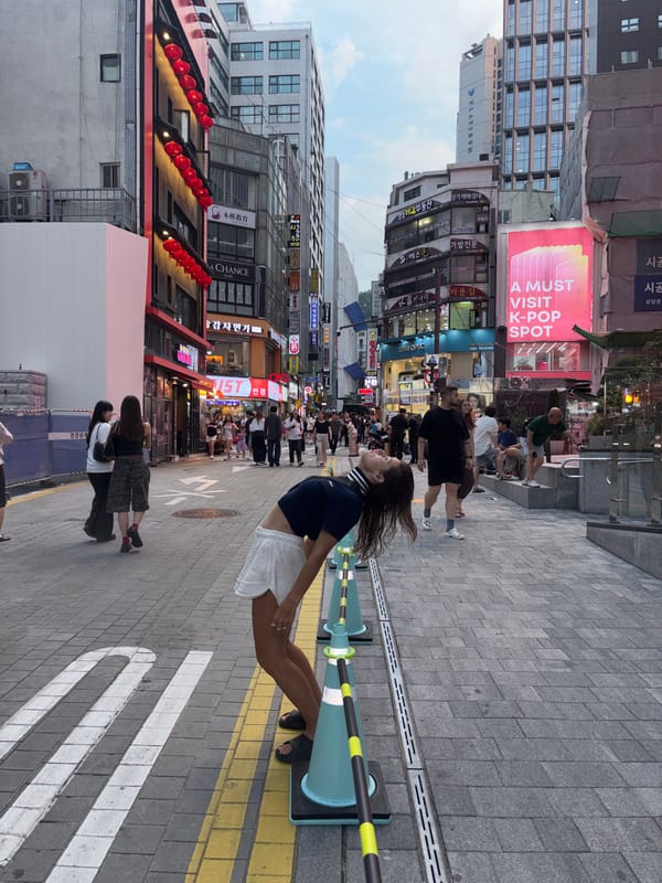Busy morning in Myeongdong's streets, shops, and crowds