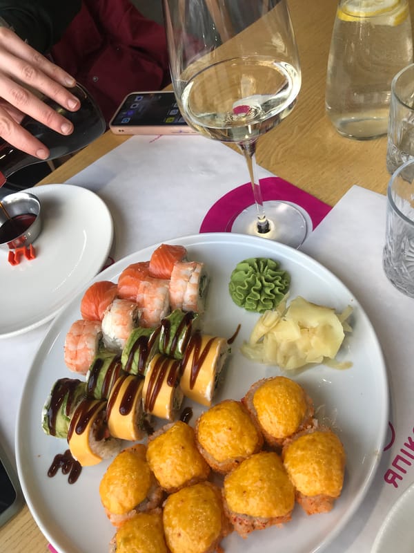 Sushi dining moment captured in San Martín de Porres