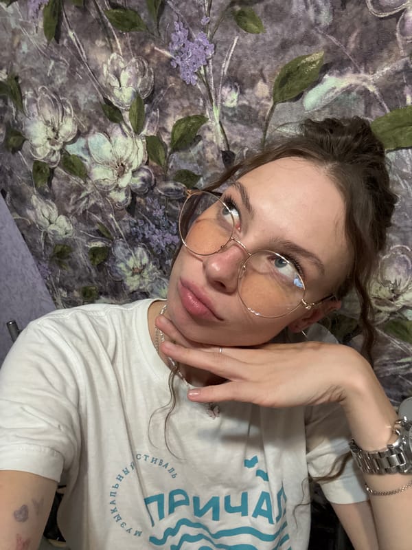 Casual selfie session at home in Perm, butterfly mug in hand