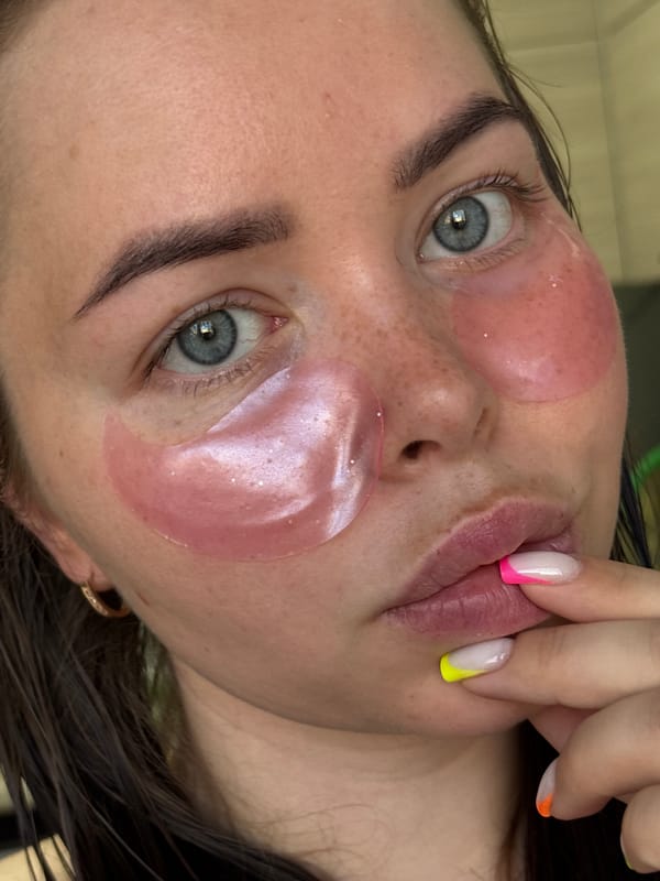 Woman's skincare routine captured in nighttime portrait in Izhevsk