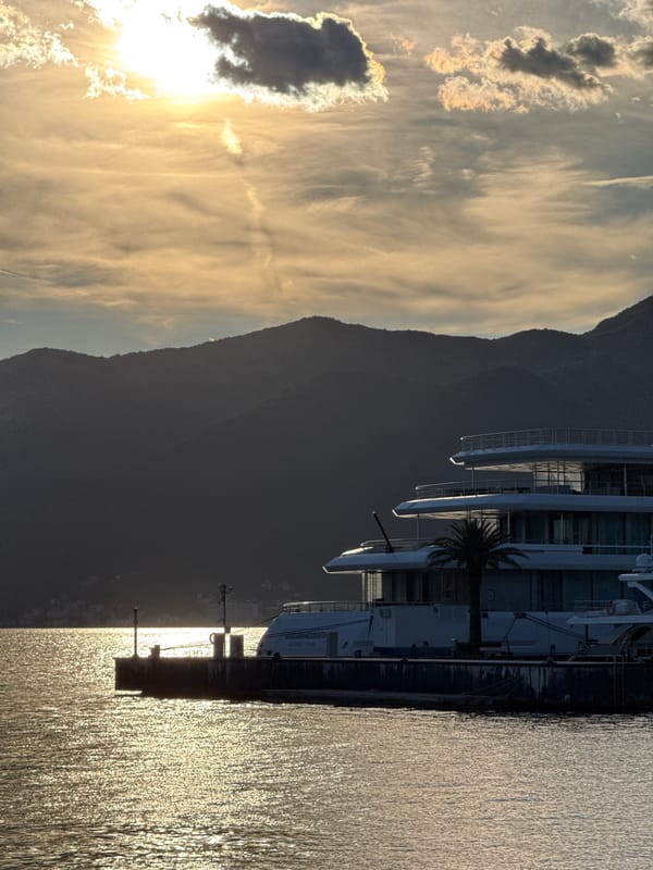 Evening scenes at Porto Montenegro marina with yachts and sunset