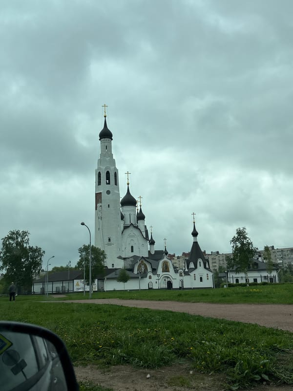 Orthodox church with black domes observed in Saint Petersburg