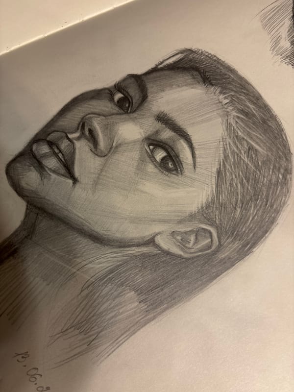 Artist sketches multiple portraits in Izhevsk