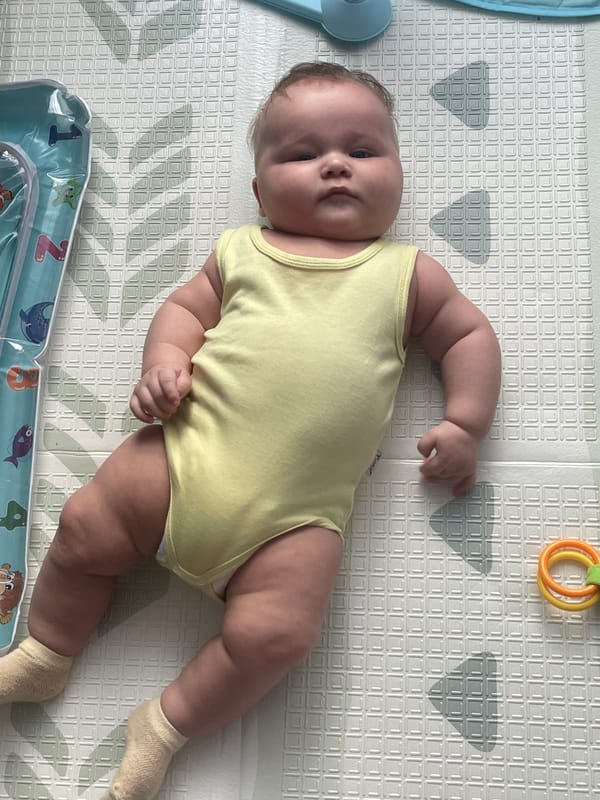 Baby on play mat, Stavropol