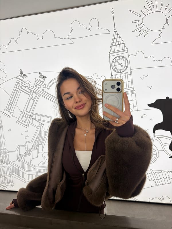 Woman takes selfies at London mural in Krasnoyarsk