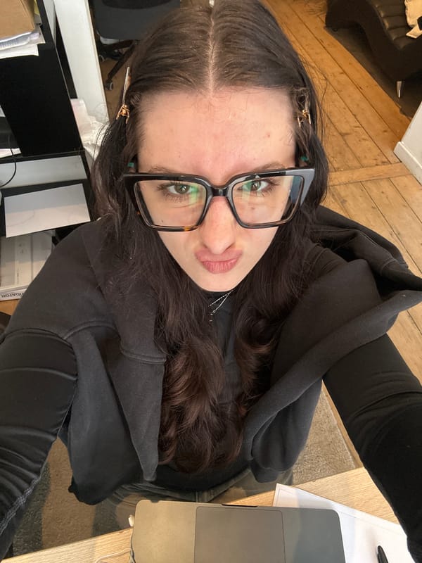 Two women take morning selfies in Antwerp apartments