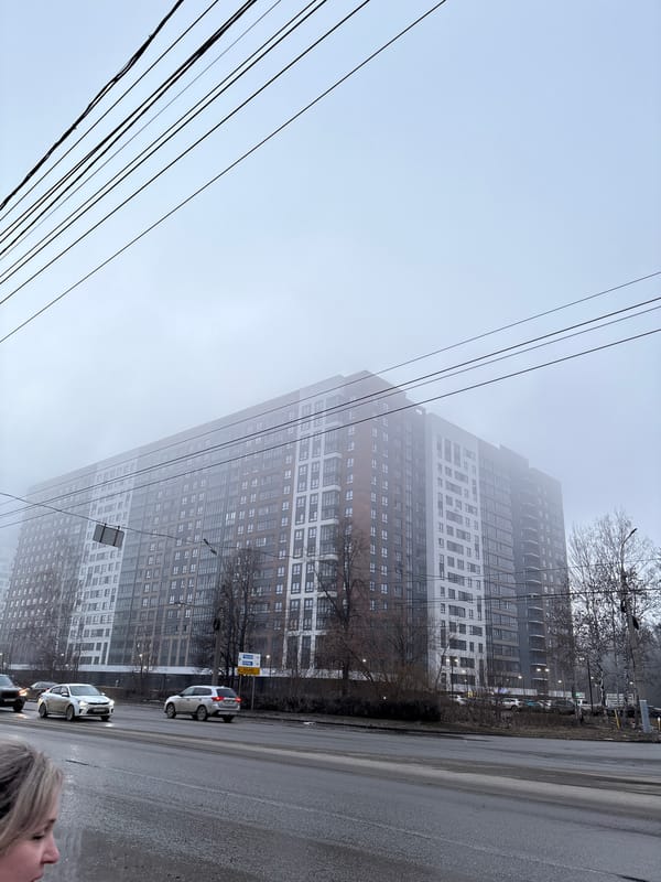 Foggy conditions observed on Izhevsk street with apartment building