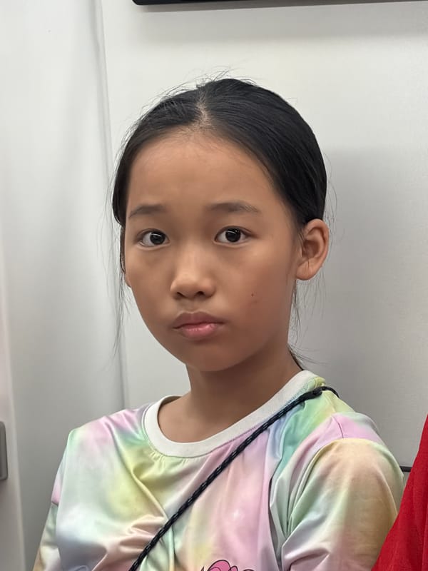 Candid indoor moments: subway seat, phone screen, camera gaze