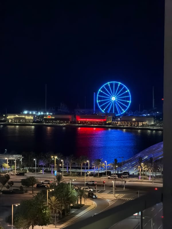 Nighttime views captured of illuminated Lusail waterfront from elevated perspective