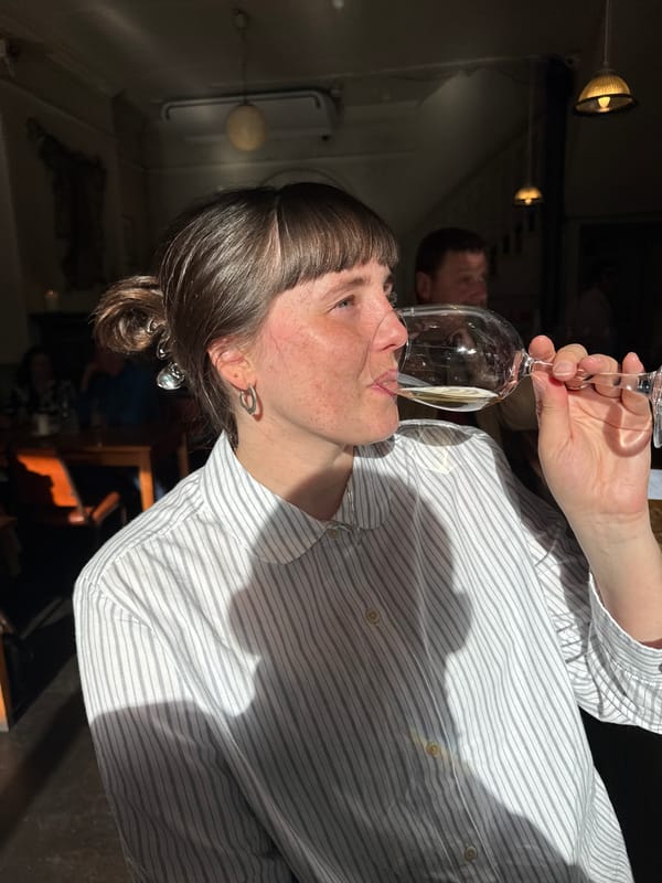 London resident enjoys drink during afternoon social gathering